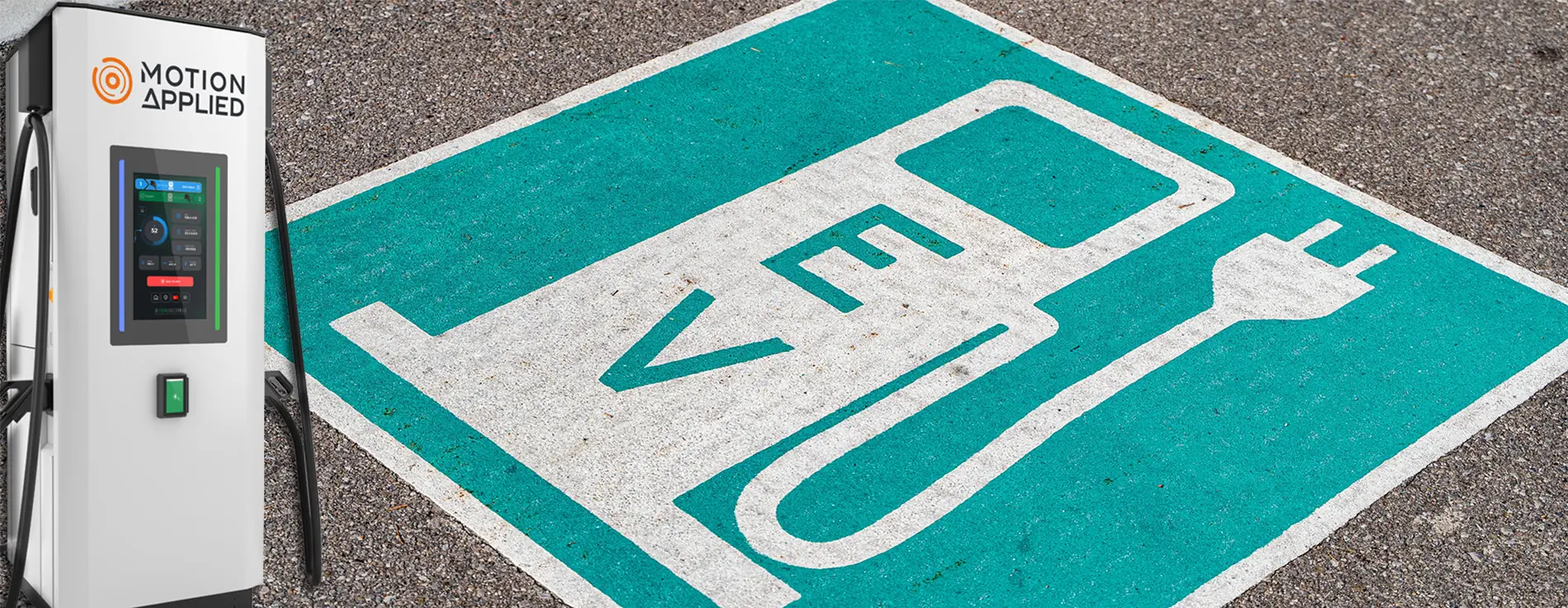 Close-up of an electric vehicle charging connector plugged into a station, with text overlay reading ‘Motion Applied launches AMPEX Ultra-Rapid EV Charging solutions to transform UK infrastructure.’ AMPEX logo appears in the bottom right corner.