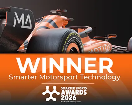 Orange and black race car detail with rear wheel and bodywork, overlaid with text 'WINNER Smarter Motorsport Technology' and 'Smarter Sports Awards 2026'.
